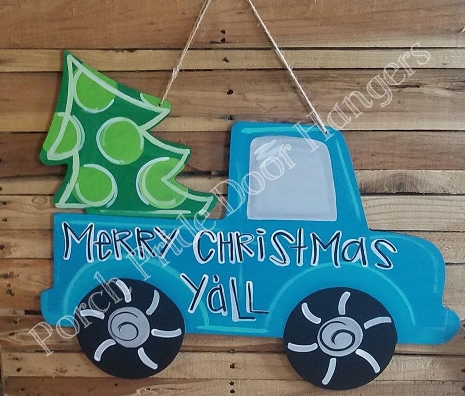 http://porchpridedoorhangers.com/cdn/shop/products/Merry_Christmas_Truck_with_Tree_Door_Hanger_1200x1200.jpg?v=1605993226